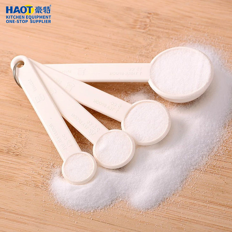 Plastic measuring spoon