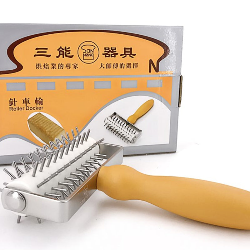 Stainless steel pizza puncher