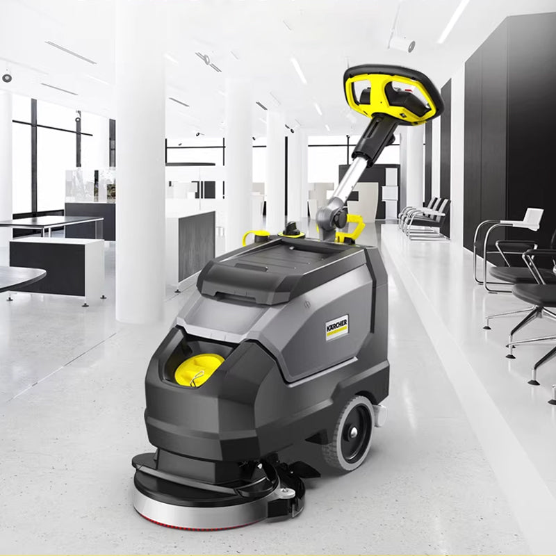 Hand pushed floor scrubber