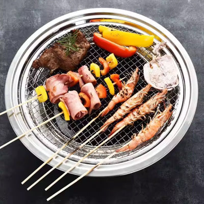 Portable charcoal round burning oven