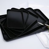 Black plastic tray